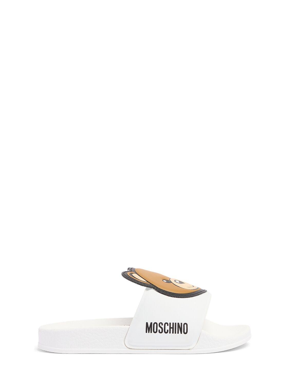 Logo Print Rubber Slide Sandals W/ Patch by MOSCHINO