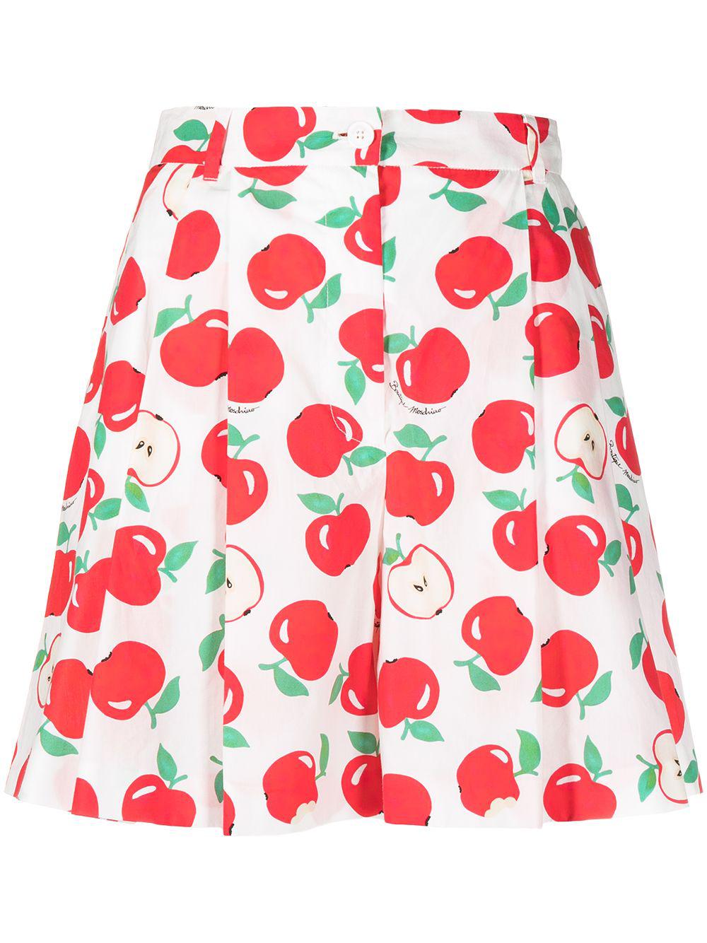 apple print pleated shorts by MOSCHINO