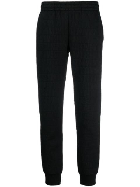 flocked-logo elasticated-waist track pants by MOSCHINO