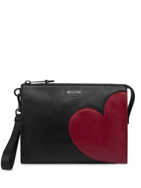 heart-appliquéd leather clutch bag by MOSCHINO
