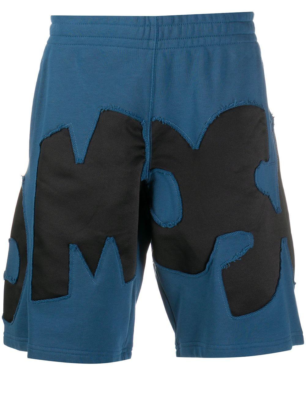 logo-appliqued track shorts by MOSCHINO