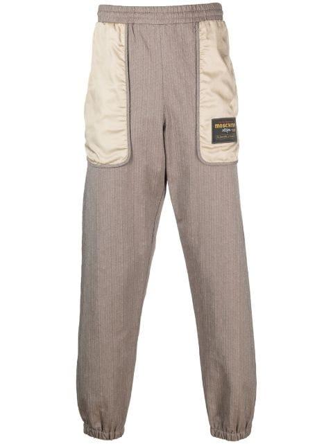 logo-patch panelled track pants by MOSCHINO