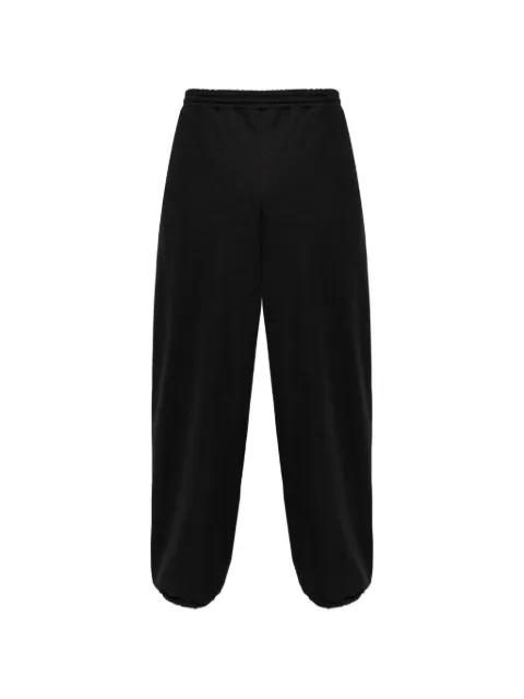 logo stripe trousers by MOSCHINO