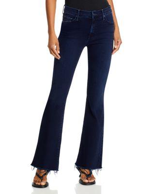 The Weekender Mid Rise Flared Jeans in Chip On My Shoulder by MOTHER