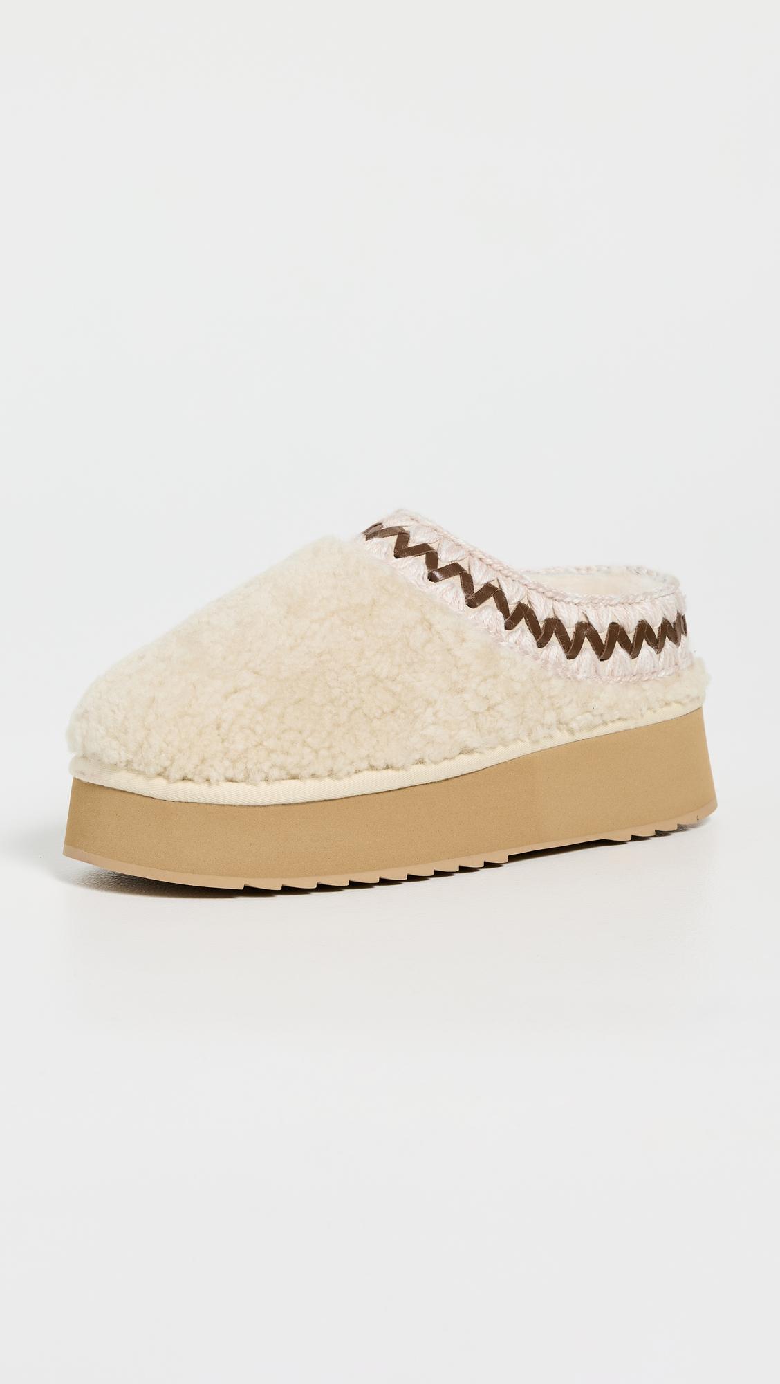 Curly Platform Clogs by MOU