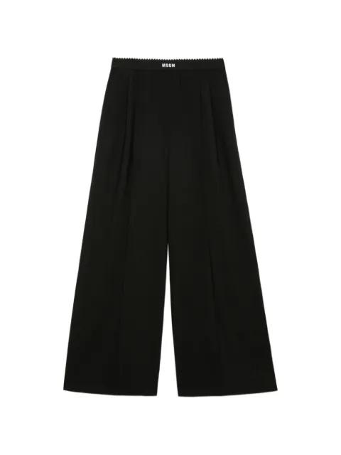 logo-waistband pleated-design trousers by MSGM