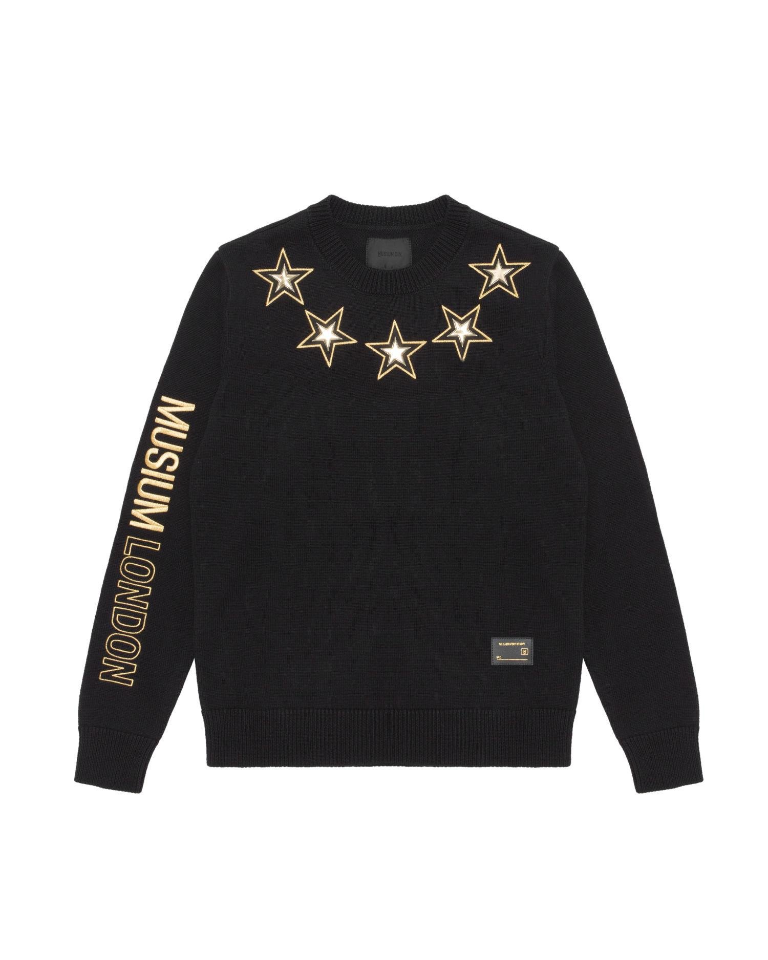 Star patch knit sweater by MUSIUM DIV.