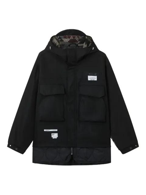 logo-patch parka coat by MUSIUM DIV.