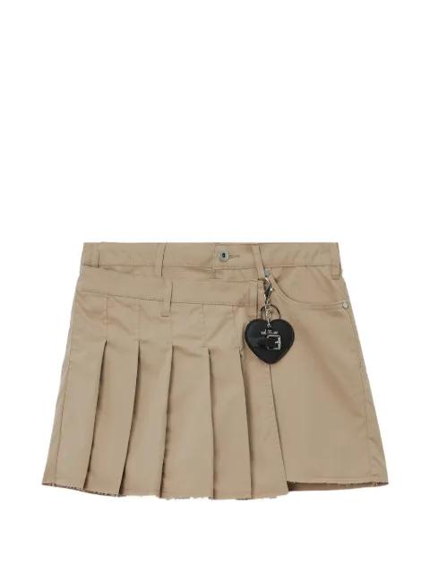pleated heart-charm shorts by MUSIUM DIV.