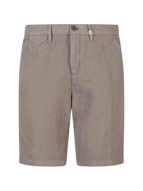button-fastening shorts by MYTHS