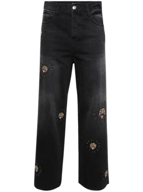 Beaded Sun jeans by NAHMIAS