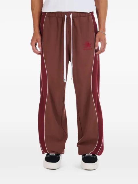 Ollie colourblock piped-detail trousers by NAHMIAS