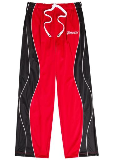 Ollie logo panelled jersey track pants by NAHMIAS