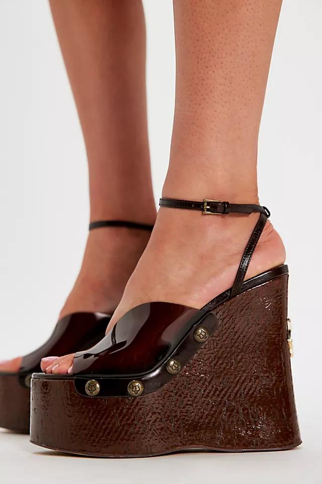 Tiger Lilly Vinyl Clogs by NAKED WOLFE | FREE PEOPLE