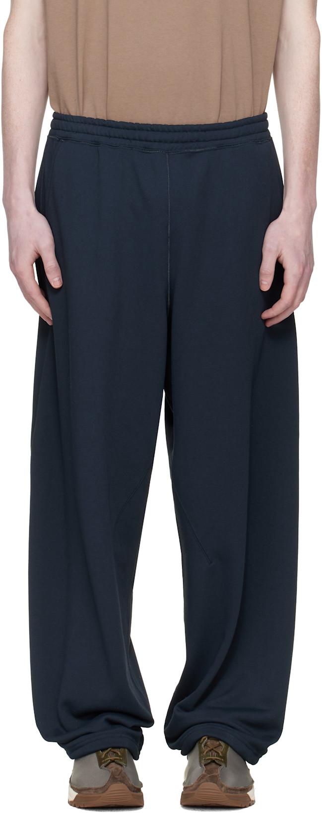 Navy Polyester Pile Sweatpants by NANAMICA