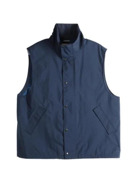 high-neck press-stud gilet by NANAMICA