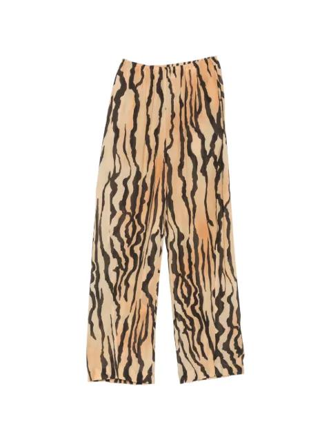 Zoela tiger-print wide-leg trousers by NANUSHKA