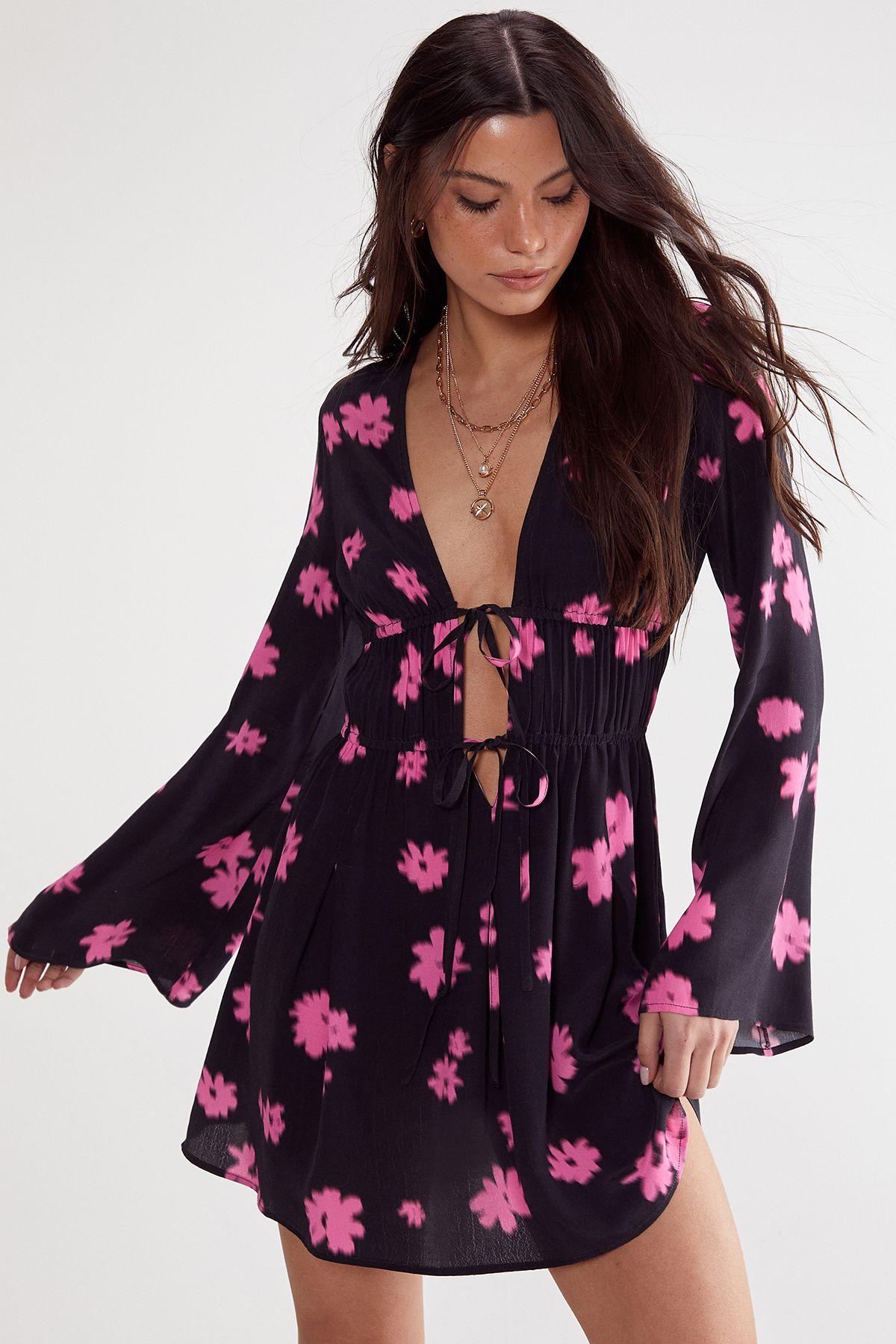 Ditsy Floral Ruched Tie Fluted Sleeve Mini Dress by NASTYGAL