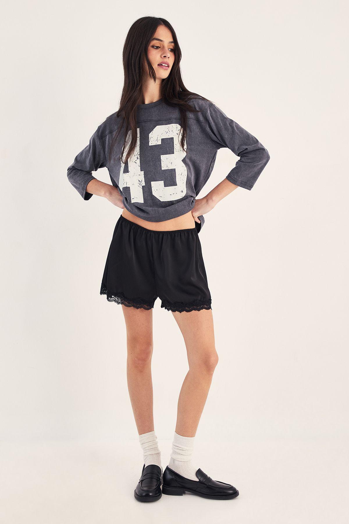 Varsity Long Sleeve Acid Wash Graphic T-Shirt by NASTYGAL