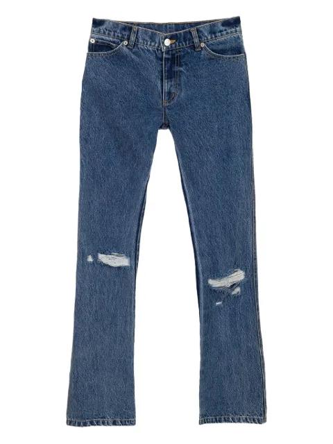 distressed flared jeans by NATASHA ZINKO