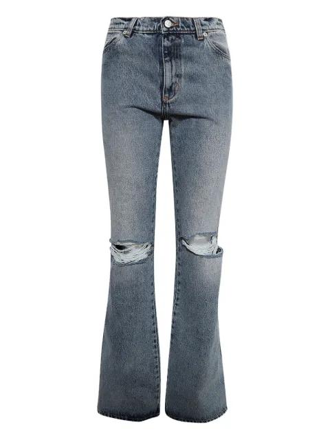 distressed flared jeans by NATASHA ZINKO