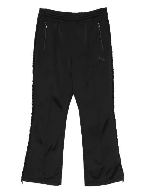 fringed logo trousers by NEEDLES