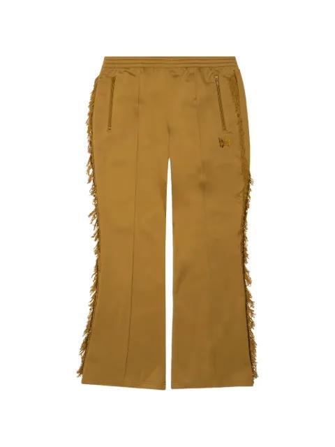 fringed track pants by NEEDLES