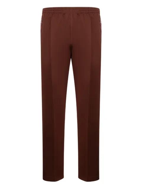 striped track pants by NEEDLES