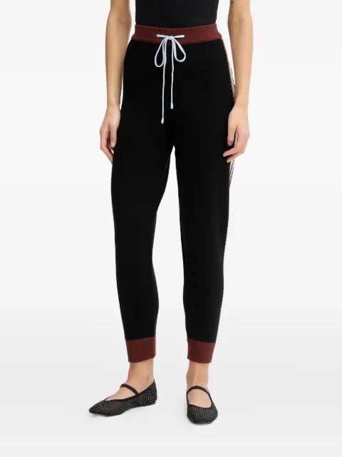 drawstring palm tree track pants by NEVER FULLY DRESSED