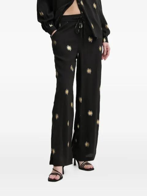 sun-print trousers by NEVER FULLY DRESSED