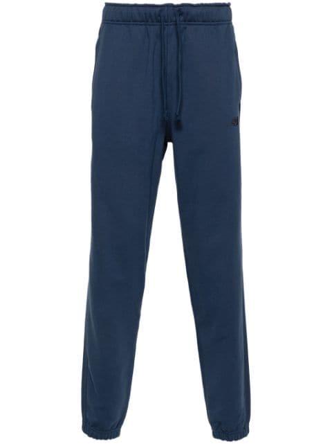 Athletics track pants by NEW BALANCE