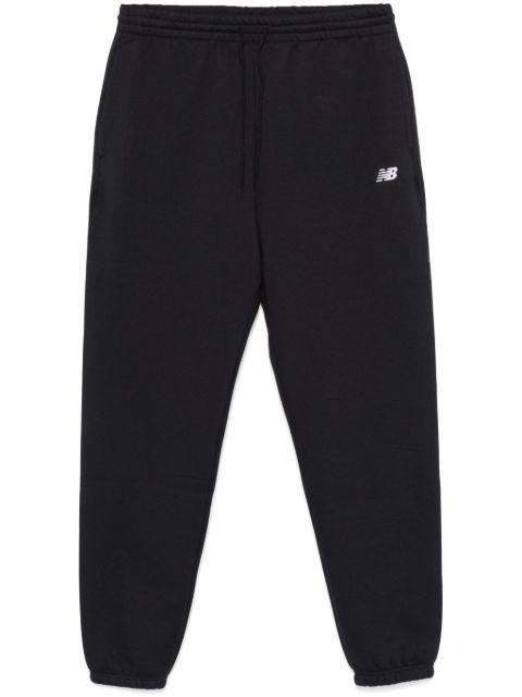 Sport Essentials "Black" track pants by NEW BALANCE