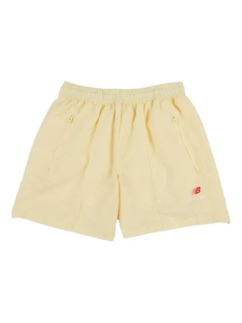 pintuck running shorts by NEW BALANCE