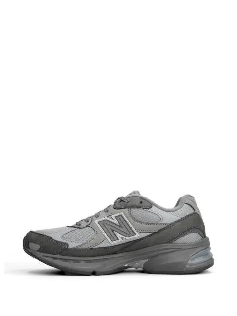 x Comme Des Garçons Homme panelled logo-patch sneakers by NEW BALANCE
