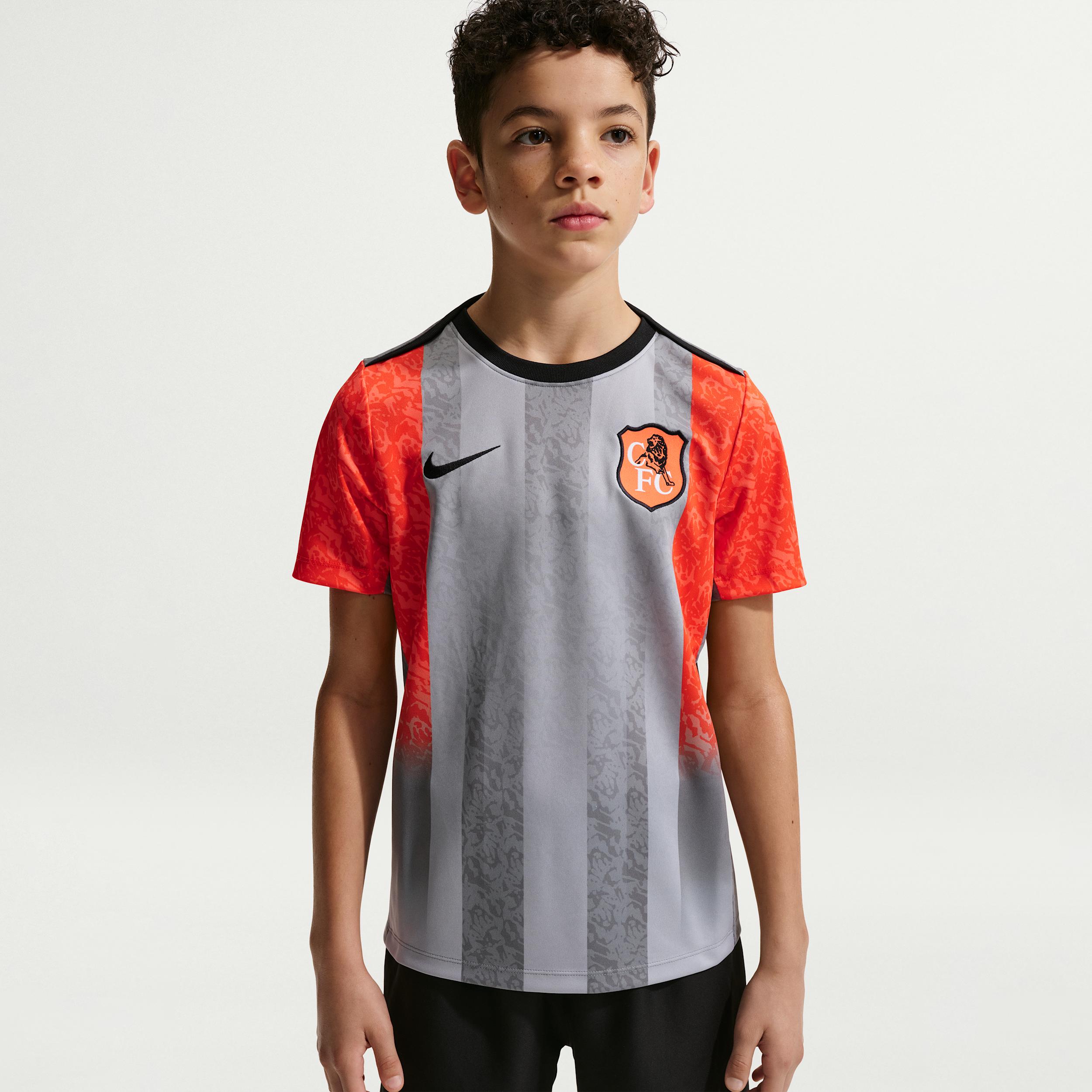 Chelsea FC Academy Pro SE Big Kids' Nike Dri-FIT Soccer Pre-Match Short-Sleeve Top by NIKE