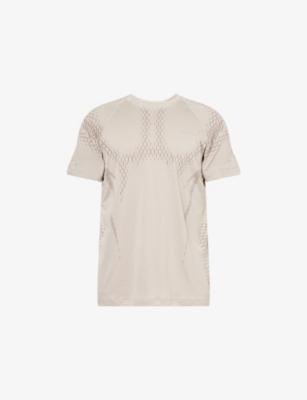 Dri-FIT ADV Crewneck Woven T-Shirt by NIKE