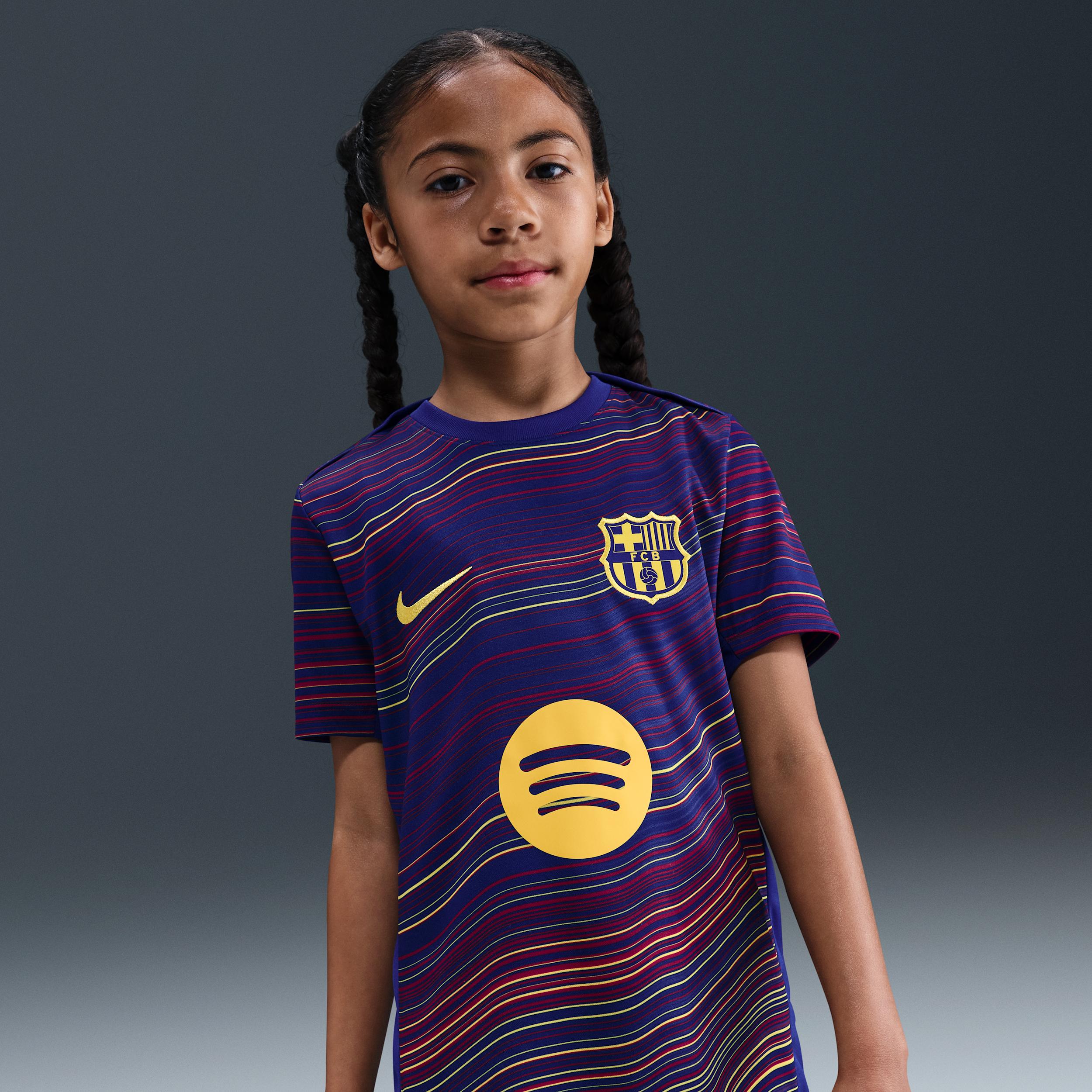 FC Barcelona Academy Pro Home Big Kids' Nike Dri-FIT Soccer Pre-Match Short-Sleeve Top by NIKE