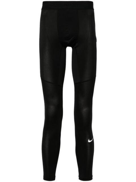 Fitness logo-waistband compression tights by NIKE