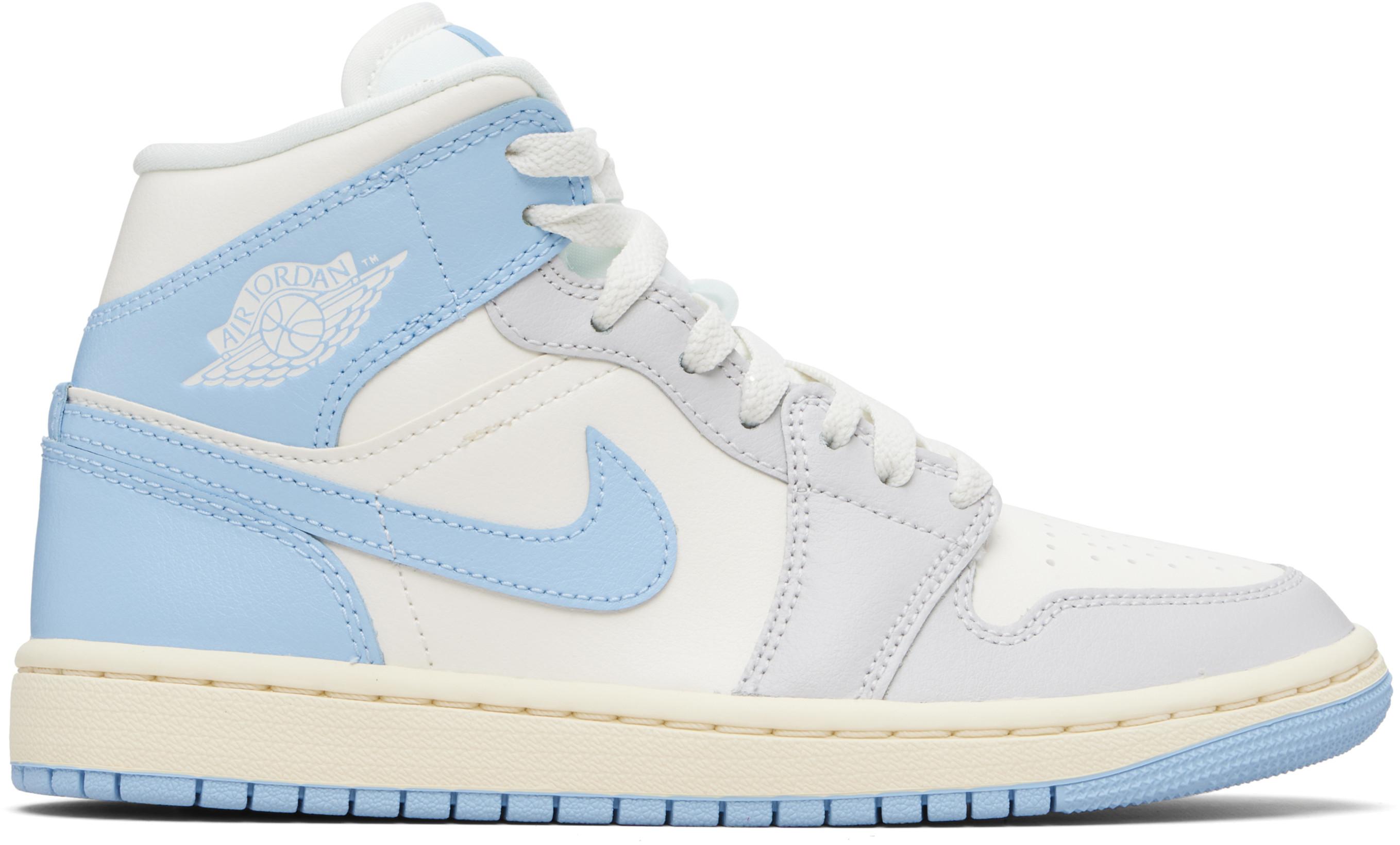 White & Blue Air Jordan 1 Mid Sneakers by NIKE JORDAN