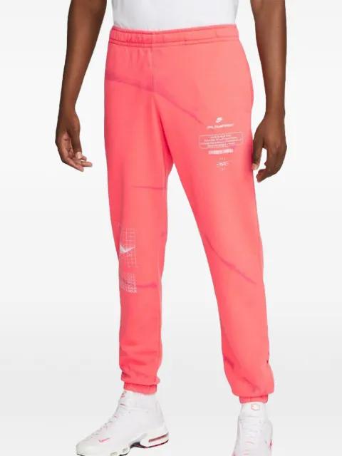 Mind Body Sole track pants by NIKE