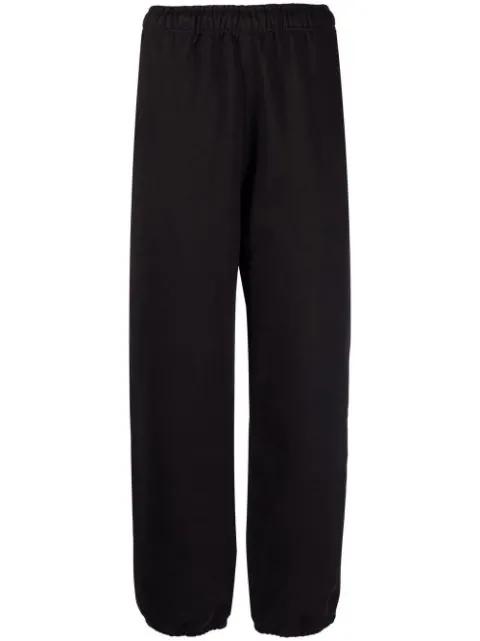 NRG Solo Swoosh track pants by NIKE