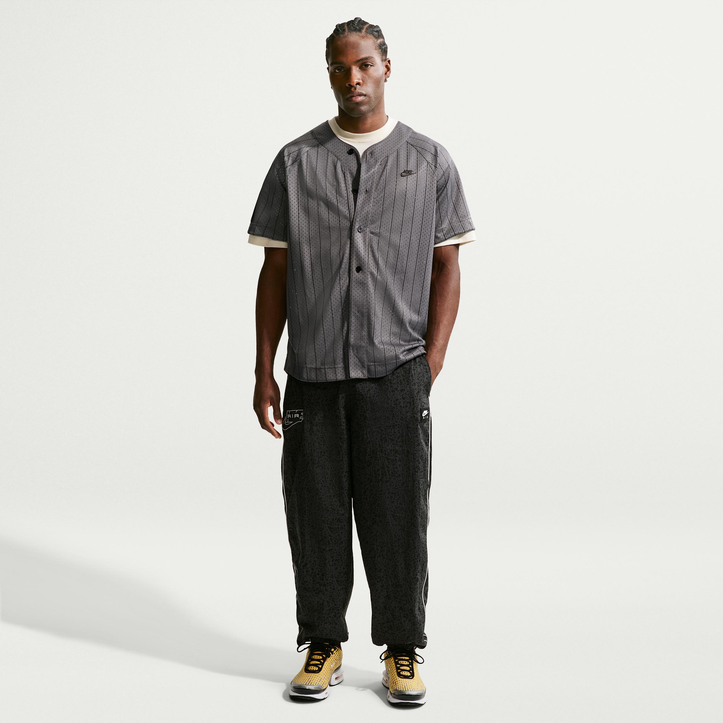 Nike Men's Air Woven Pants by NIKE