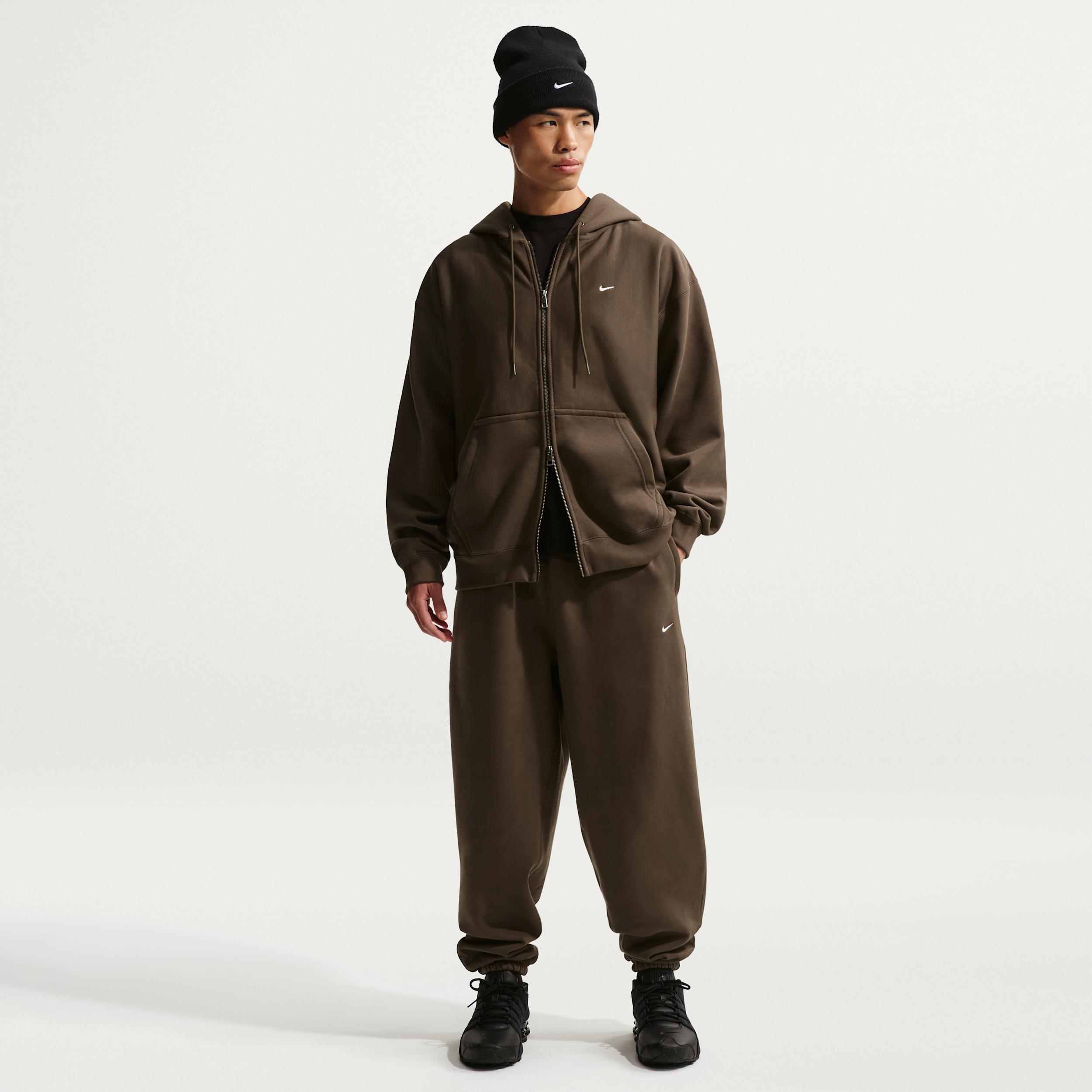 Nike Men's Solo Swoosh Cuffed Fleece Pants by NIKE