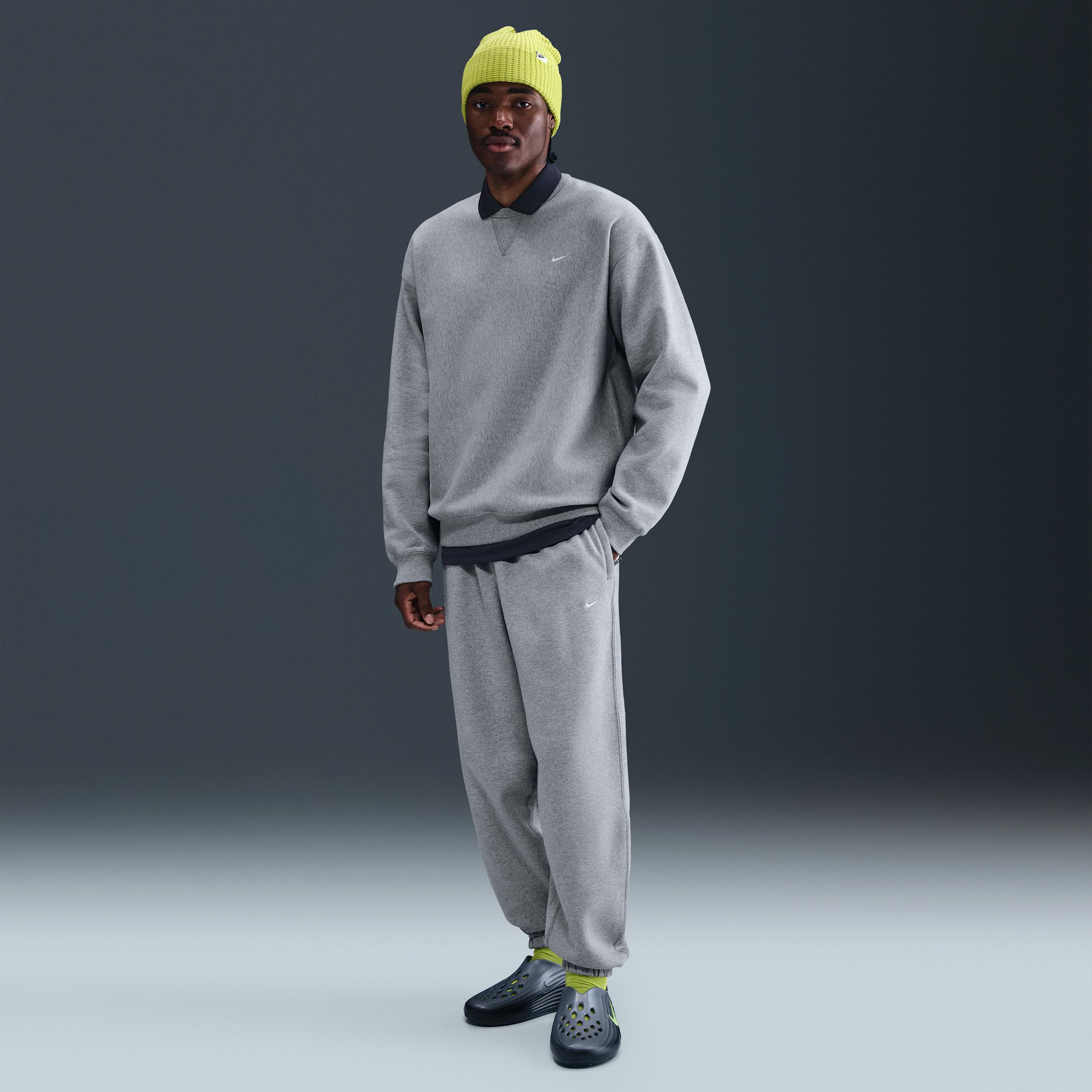 Nike Men's Solo Swoosh Cuffed Fleece Pants by NIKE