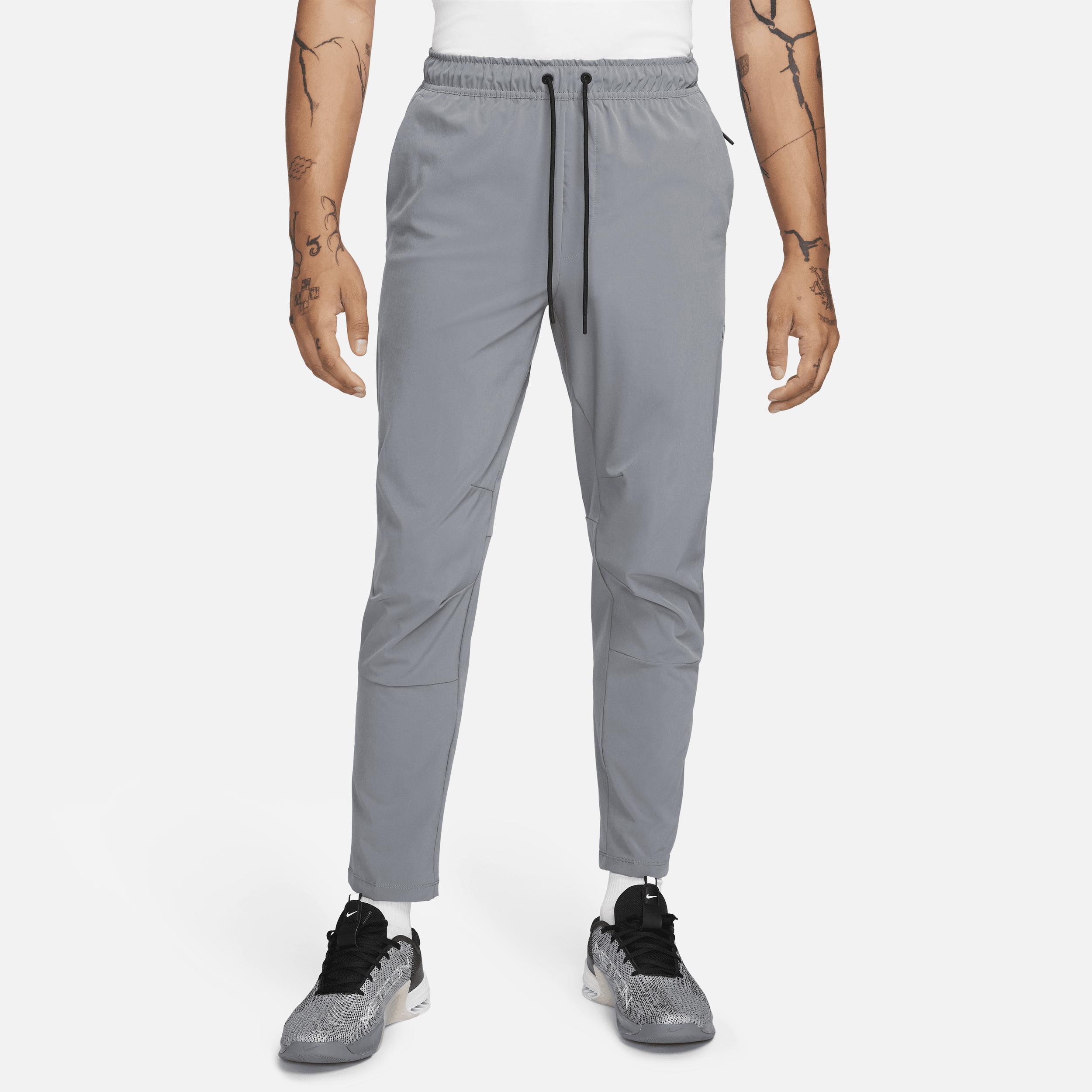 Nike Men's Unlimited Dri-FIT Tapered Leg Versatile Pants by NIKE