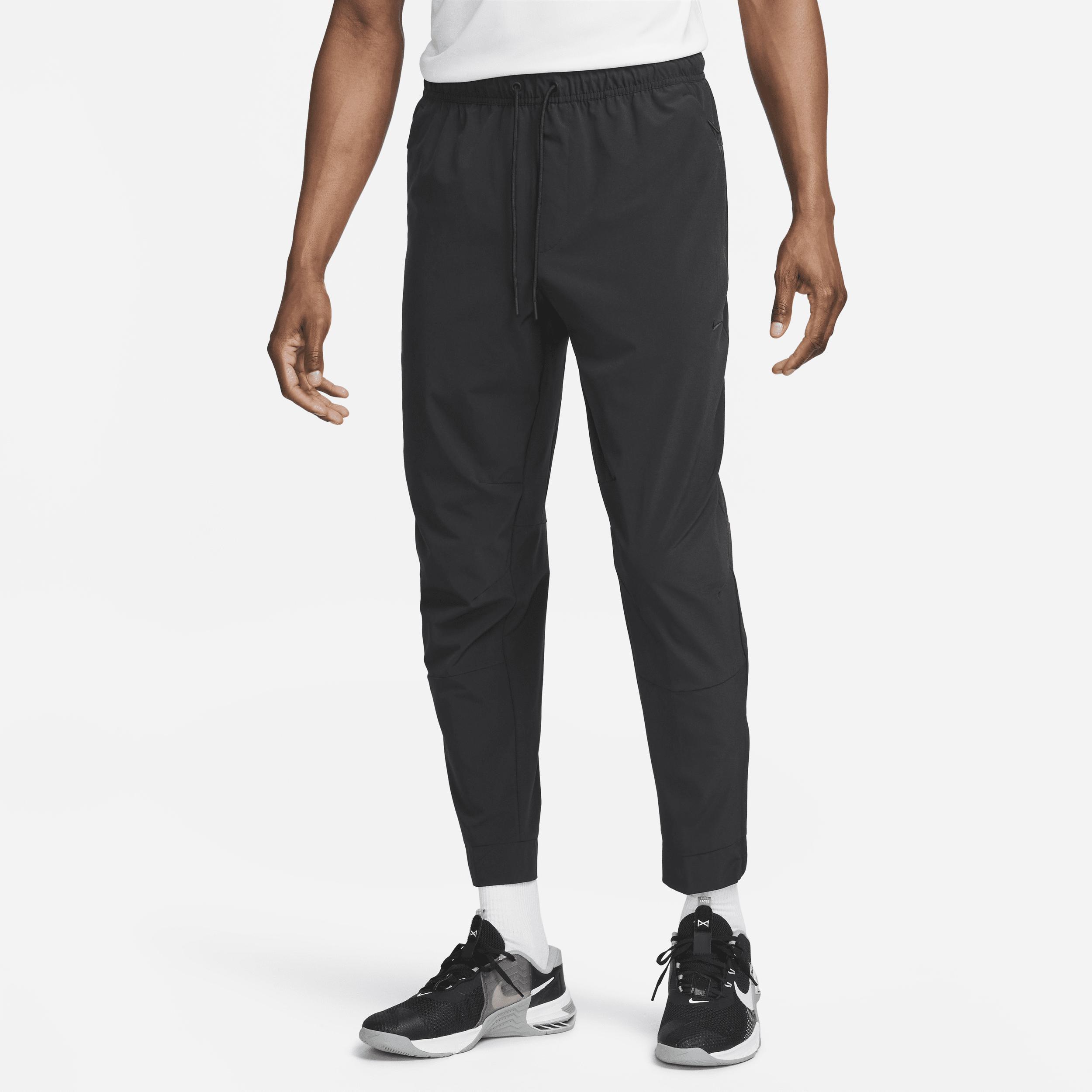 Nike Men's Unlimited Dri-FIT Zippered Cuff Versatile Pants by NIKE