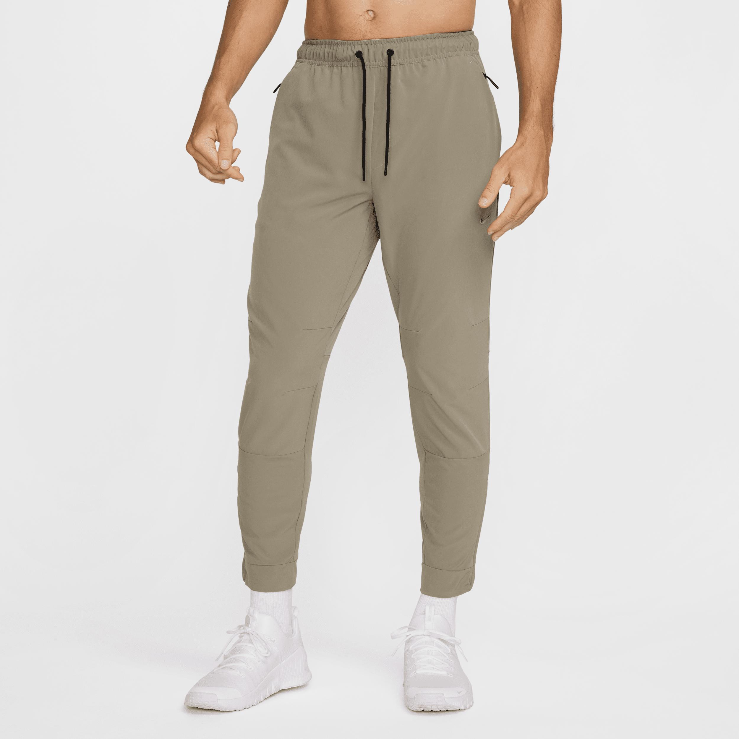 Nike Men's Unlimited Dri-FIT Zippered Cuff Versatile Pants by NIKE