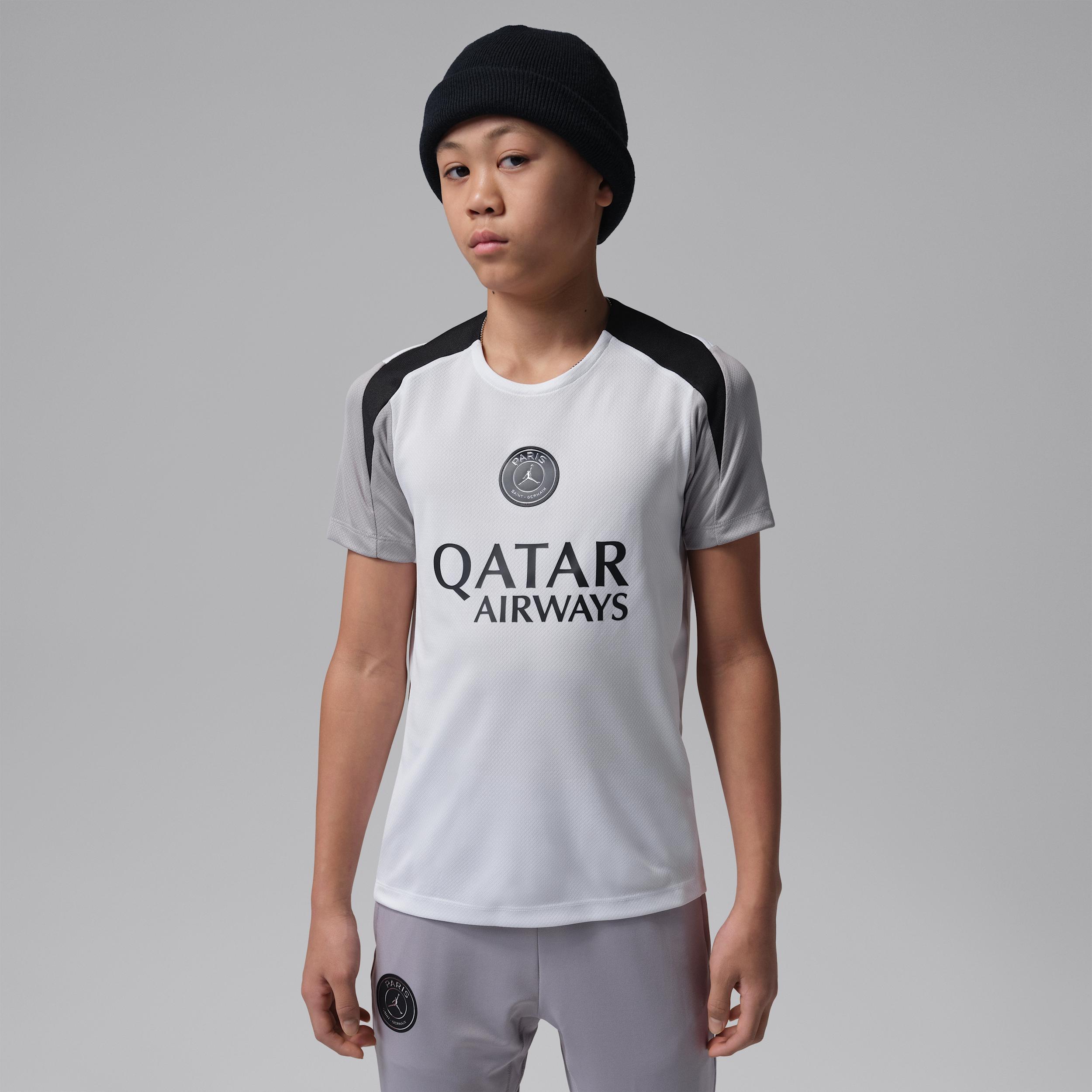 Nike Paris Saint-Germain Strike Night Edition Big Kids' Jordan Dri-FIT Soccer Short-Sleeve Knit Top by NIKE