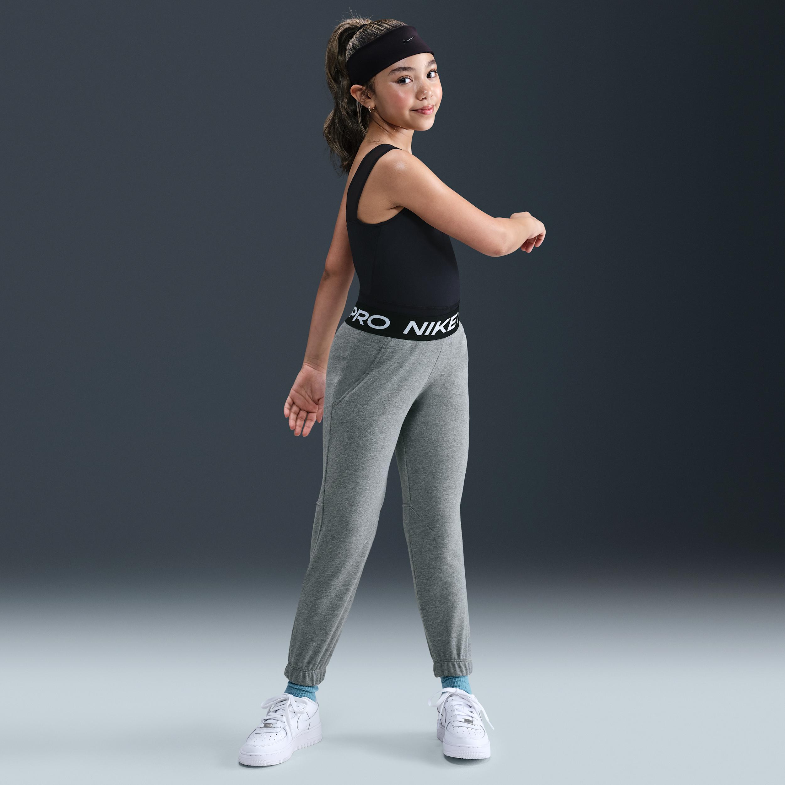 Nike Pro Fleece Big Kids' (Girls') Dri-FIT Jogger Pants by NIKE Nike Pro Fleece Big Kids' (Girls') Dri-FIT Jogger Pants by NIKE