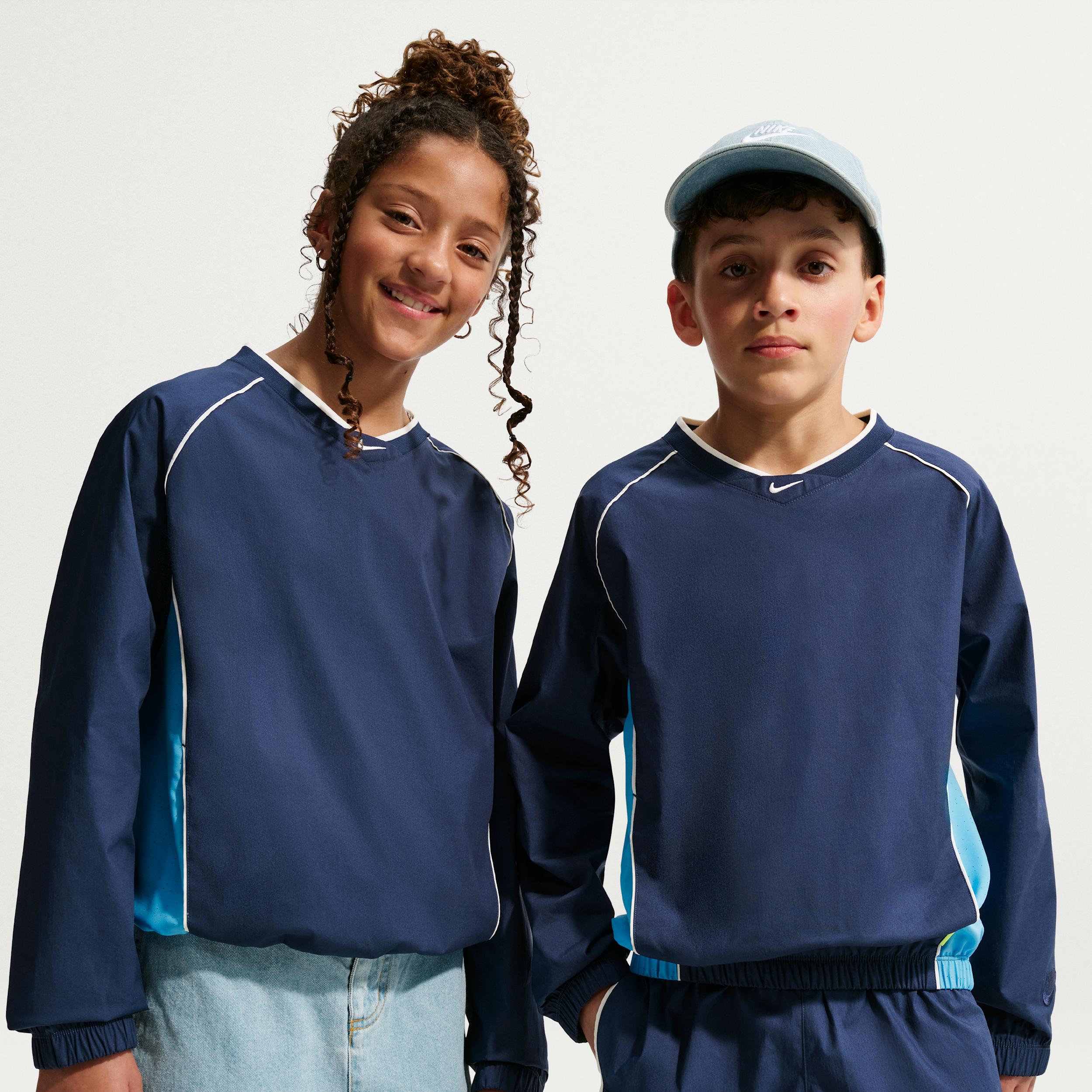 Nike Sportswear Big Kids' Woven V-Neck Long-Sleeve Top by NIKE
